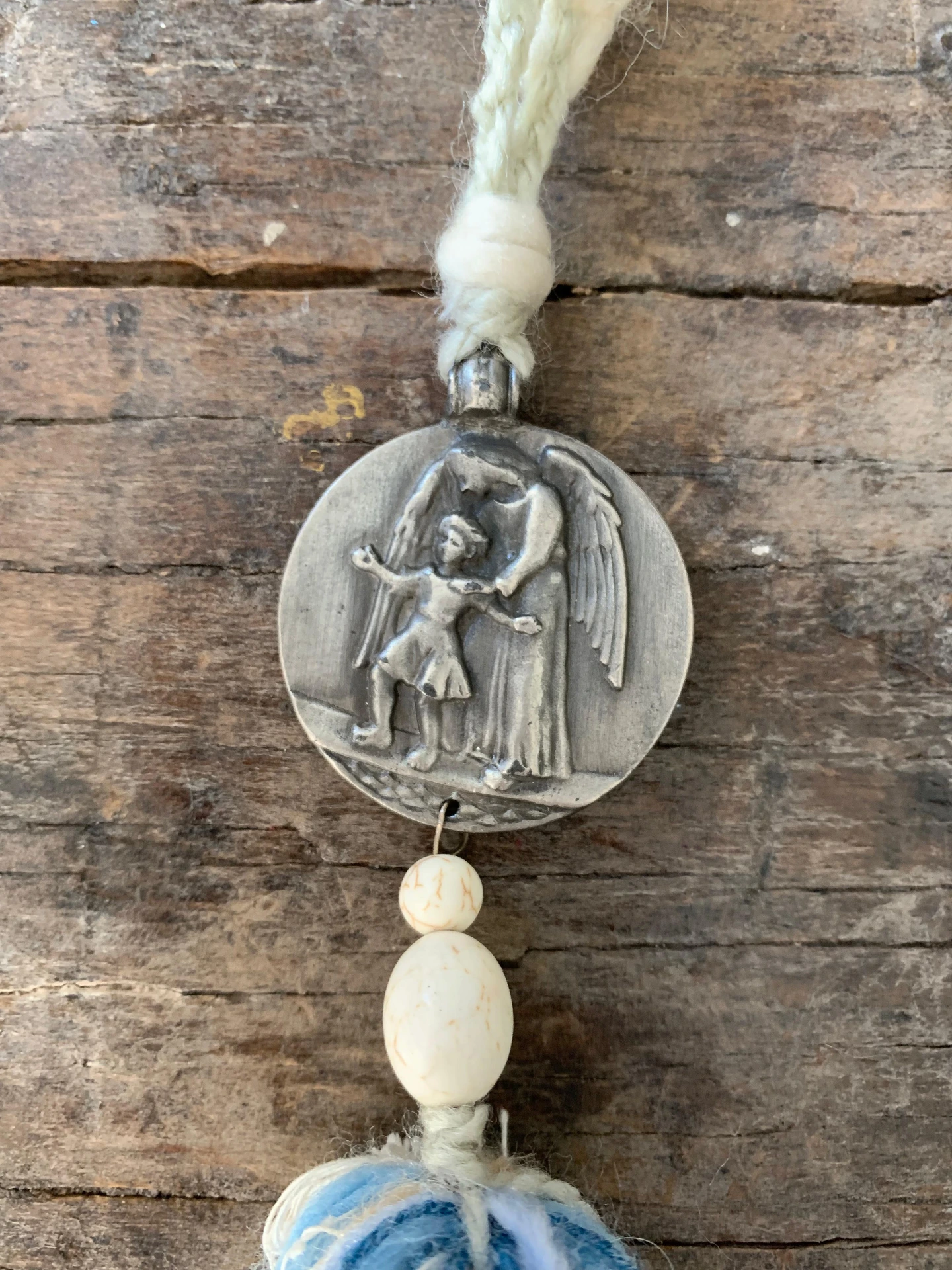 Medalla: Ángel de la Guarda